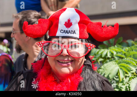 Montreal, CANADA - 20 August 2017: Woman wearing a Moose Antlers Canada Hat at Montreal Gay Pride Parade Stock Photo