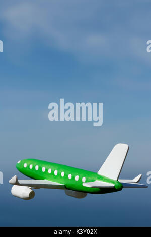 Model Aircraft with the ocean and sky in the background Stock Photo
