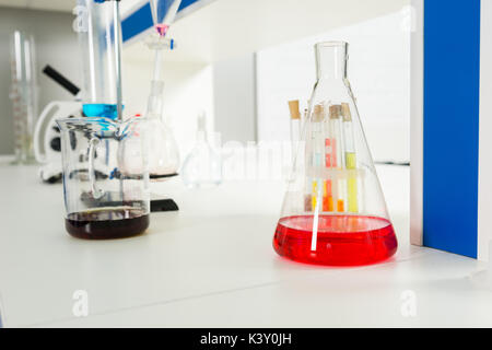 Chemical analysis glassware in laboratory. Healthcare and biotechnology concept Stock Photo