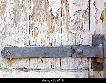Detailed image of an old gate painted in white Stock Photo