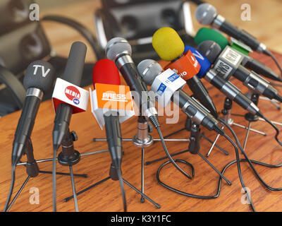 Press conference or interview concept. Microphones of different mass media, radio, tv and press prepared for conference meeting. 3d illustration Stock Photo