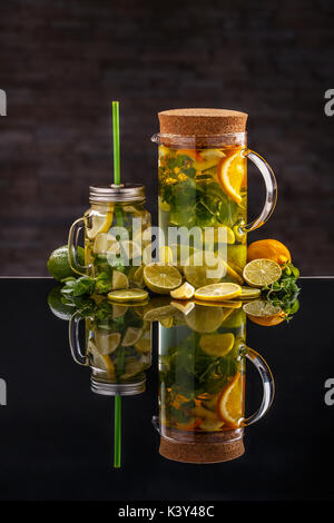 Lemonade with fresh lemons on glass background, clipping path Stock Photo