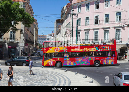 City sightseeing bus in Lisbon, the capital and the largest city of Portugal in the Alfama District on the Atlantic coast in Western Europe Stock Photo