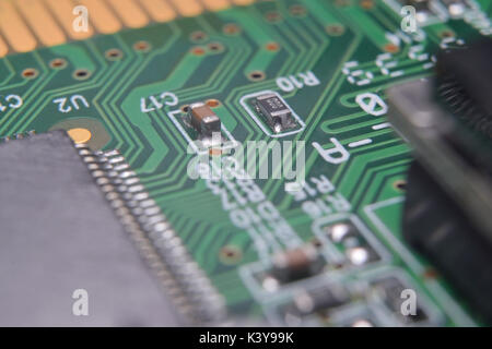 close up of electronic components on pcb board Stock Photo