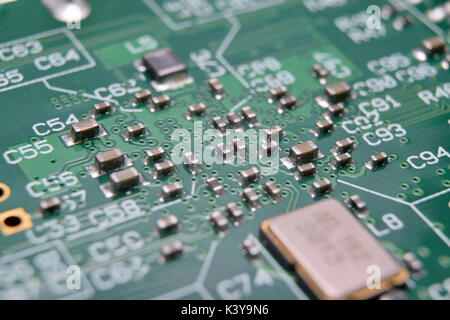 close up of electronic components on pcb board Stock Photo