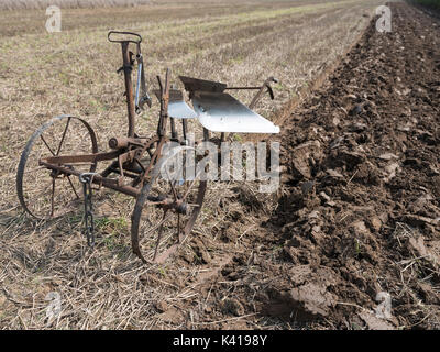 old vintage horse drawn plow on field in the netherlands Stock Photo