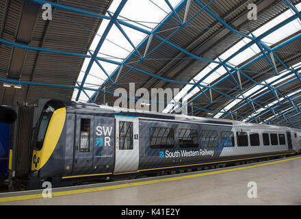 South Western Railway's first fully-liveried Class 444 train arrives into the former international terminal at Waterloo station in central London. Stock Photo