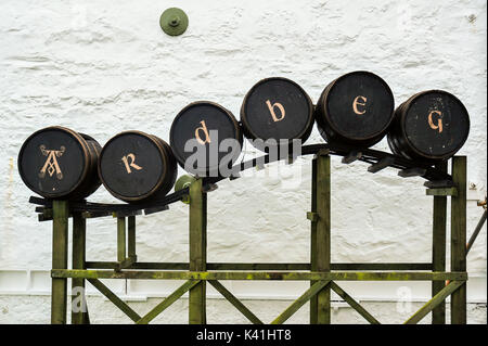 Barrel display at the renowned Arbdeg Distillery on the Isle of Islay, Scotland Stock Photo
