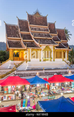 Famous night market and the Haw Pha Bang temple in Luang Prabang, inside the Royal Palace complex, in Laos