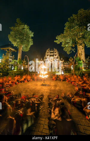 Ubud, Indonesia - August 8, 2016: Traditional Kecak Fire Dance ceremony in Hindu temple. Stock Photo