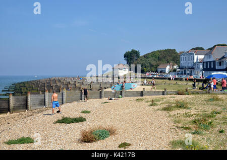 Holidaymakers on the beach at Whitstable in Kent during the August Bank Holiday weekend Stock Photo