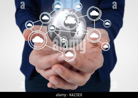 Digital composite of Business woman holding a globe with connectors Stock Photo