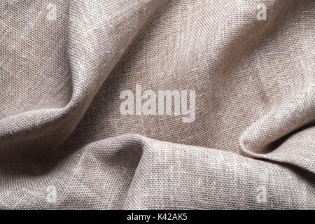 Background of linen napkin folded in folds horizontal Stock Photo