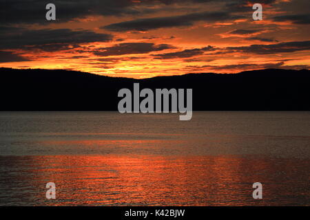 Sunset over Norwegian fjord Stock Photo