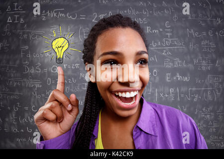happy schoolgirl genius in mathematics have a solution Stock Photo