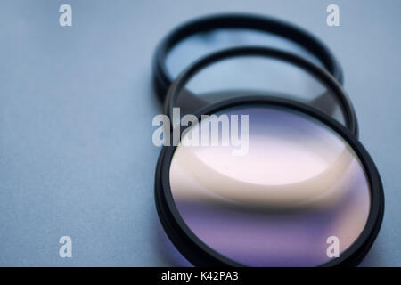 Camera lens filters - Ultra-Violet Filter (UV), Circular Polarizer Filter (CP), Neutral Density Filter (ND) - selective focus Stock Photo