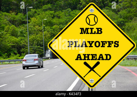 MLB playoffs ahead, yellow warning road sign Stock Photo