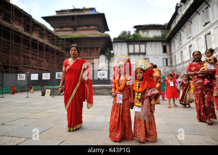 Kathmandu, Nepal. 04th Sep, 2017. Nepalese young girls impersonate as a Kumari or living Goddess participate during celebration of Kumari puja at Basantapur Durbar Square, Katmandu, Nepal on Monday, September 04, 2017. Altogether 108 young girls under the age of nine gathered for the Kumari puja, a tradition of worshiping, which believes doing puja save small girls from diseases and bad luck in future. Credit: Narayan Maharjan/Pacific Press/Alamy Live News Stock Photo