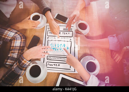 Illustration of website against friends discussing and drinking coffee Stock Photo