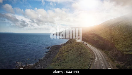 High angle view of road by sea against sky Stock Photo