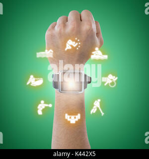 Cropped hand wearing watch against green vignette Stock Photo