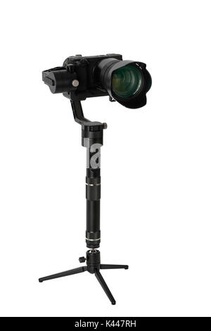 3-axis gimbals Stabilization System with Mirrorless Camera. Using this equipment, a Videographer can take video without shaking. Stock Photo