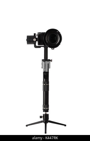 3-axis gimbals Stabilization System with Mirrorless Camera. Using this equipment, a Videographer can take video without shaking. Stock Photo