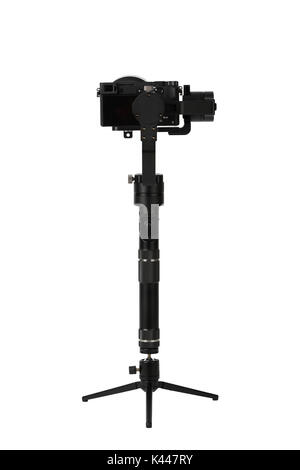 3-axis gimbals Stabilization System with Mirrorless Camera. Using this equipment, a Videographer can take video without shaking. Stock Photo