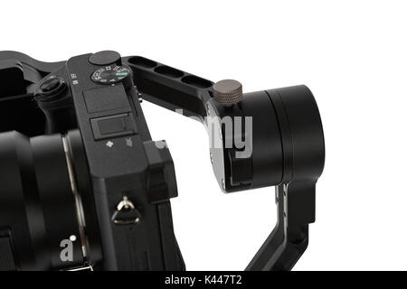 3-axis gimbals Stabilization System with Mirrorless Camera. Using this equipment, a Videographer can take video without shaking. Stock Photo
