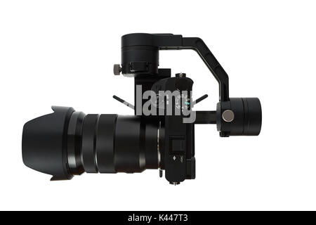 3-axis gimbals Stabilization System with Mirrorless Camera. Using this equipment, a Videographer can take video without shaking. Stock Photo