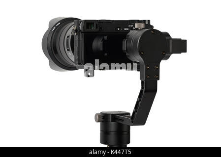 3-axis gimbals Stabilization System with Mirrorless Camera. Using this equipment, a Videographer can take video without shaking. Stock Photo