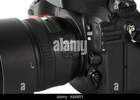 closeup of Auto focus and Manual focus switch on a dslr camera with lens. Stock Photo