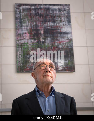 Berlin, Germany. 04th Sep, 2017. Painter and sculptor Gerhard Richter is standing in front of one his paintings that he handed over in the German Bundestag in Berlin, Germany, 04 September 2017. The series 'Birkenau' from 2014 consists of four paintings and was honoured in a ceremony by President of the Parliament Norbert Lammert. Photo: Soeren Stache/dpa/Alamy Live News