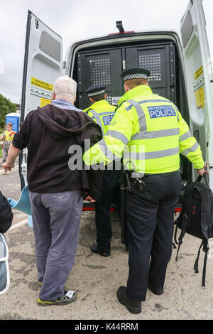 London, UK. 5th Sep, 2017. Police make several arrests as peace campaigners from Quaker and interfaith groups and Anti-war activists gather outside the Excel centre in East London to begin a week of protests  in an effort to stop weapons and military equipment arriving at Britain’s biggest arms  fair (DSEI)  which starts next week Credit: amer ghazzal/Alamy Live News Stock Photo