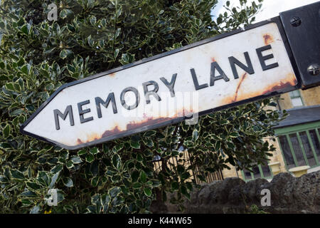 A weathered sign pointing down memory lane Stock Photo