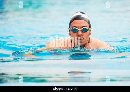 Portrait of swimming sportsman in pool. Quick smimming man Stock Photo