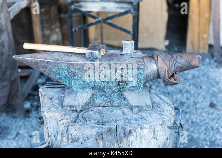 Old hammer and rusty anvil Stock Photo