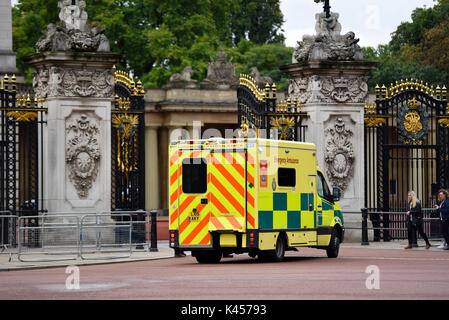 NHS ambulance arriving at Buckingham Palace gate. Copyspace Stock Photo