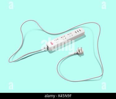 White extension cord on a green background. Concepts electricity,power Stock Photo