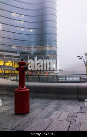 Milan, Lombardy, Italy. A red fire extinguisher. Stock Photo