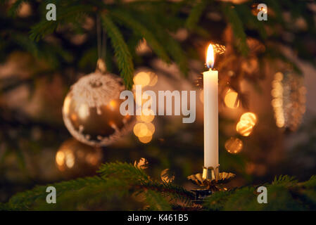Crhist tree with baubles and candles, Still life of Christmas Stock Photo