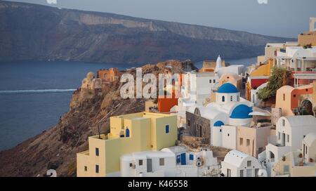 Oia, Santorini in Greece at Sunrise; less touristy than sunset but offers just the same beautiful colours of this stunning travel destination Stock Photo