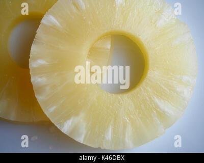 Sliced of pineapple on white background Stock Photo