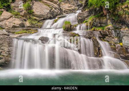 Lillaz waterfalls near Cogne, Gran Paradiso national park, Aosta Valley in the Alps, Italy Stock Photo