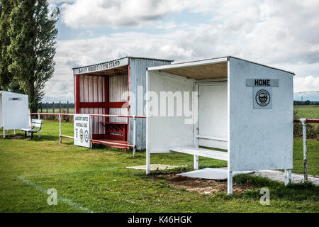 Grass roots football. Basic shelters and match stand for teams and personnel. Langtoft United Football Club home ground, England, UK. Stock Photo