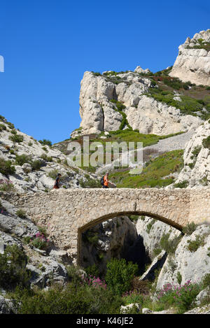 Stone Bridge on the Long Distance Coastal Footpath at Niolon on the Côte Bleue, or Blue Coast, west of Marseille Provence France Stock Photo