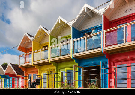 The colourful beach huts in Scarborough's North Bay Stock Photo