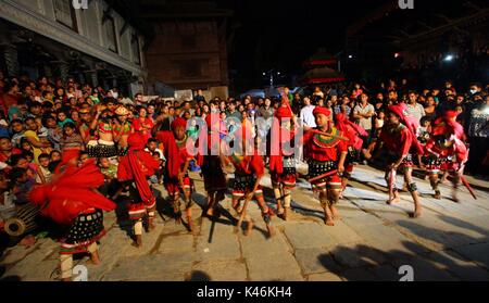 Kathmandu, Nepal. 04th Sep, 2017. Nepalese Kids perform stick dance in celebration of Indrajatra festival in Kathmandu, Nepal. Indra Jatra is an eight day festival with a chariot procession dedicated to Goddess Kumari, Lord Ganesh and Bhairav, as well as worshiping Indra, the king of gods. Credit: Archana Shrestha/Pacific Press/Alamy Live News Stock Photo