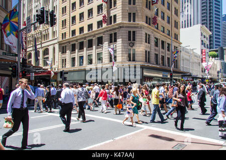 Pedestrians crossing George street on a sunny day, Sydney, NSW, New South Wales, Australia Stock Photo