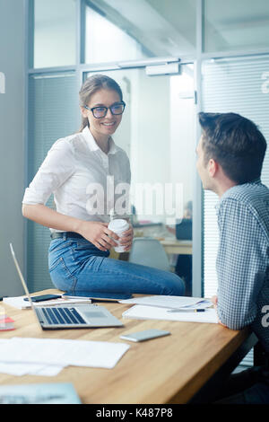 Talking at coffee break Stock Photo